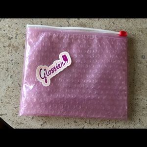 Glossier packaging with sticker
